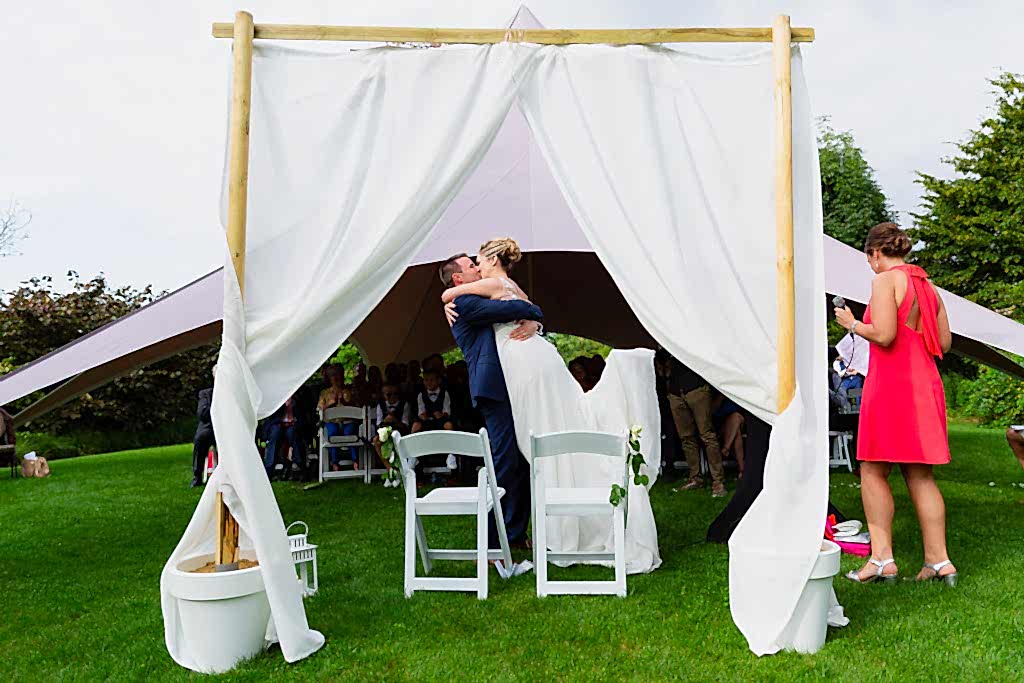 Bride and groom kissing at Belgium Garden Wedding