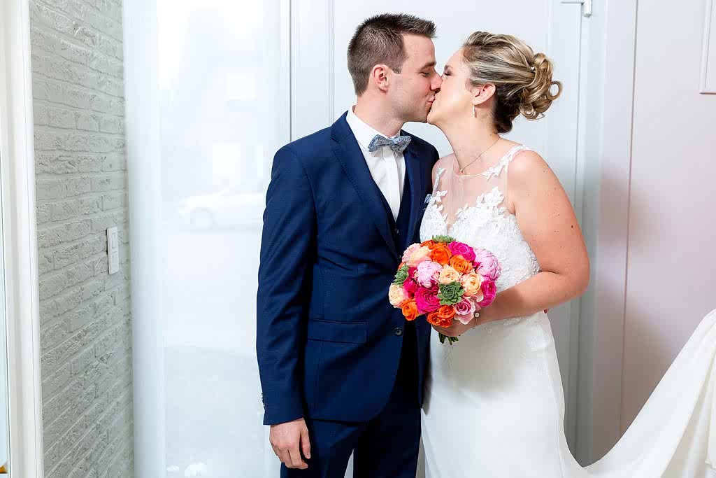bride and groom kissing
