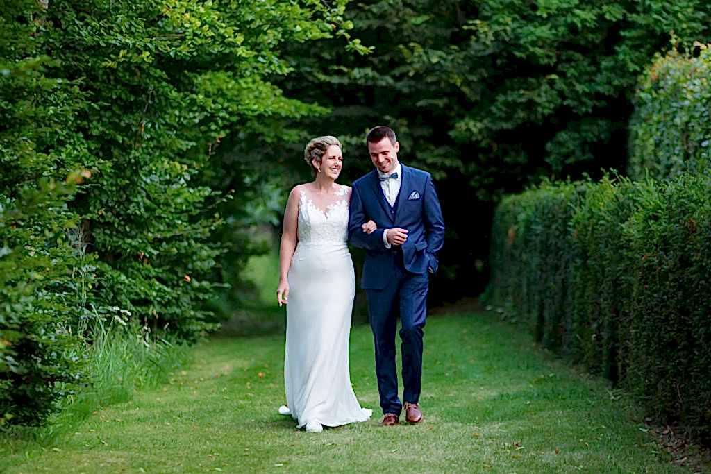 Couple walking after Belgium Garden Wedding