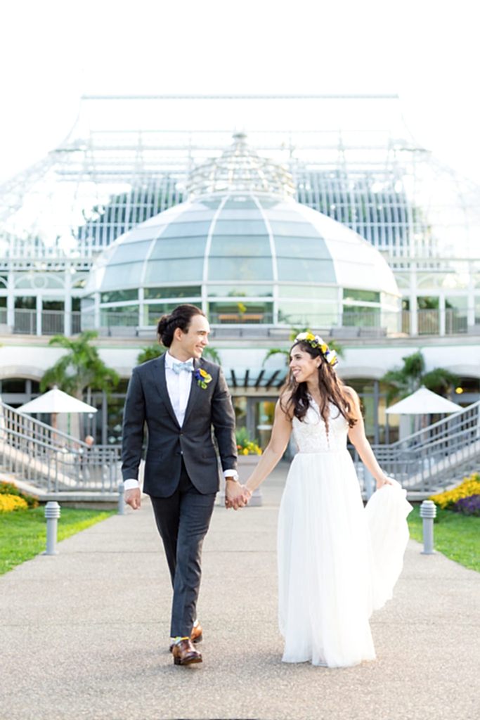 Phipps Conservatory Wedding bride and groom walking together