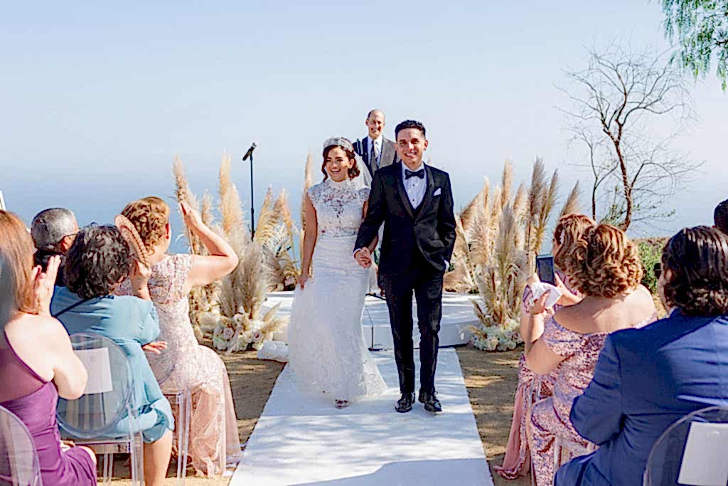 Malibu Estate wedding couple walking down the aisle