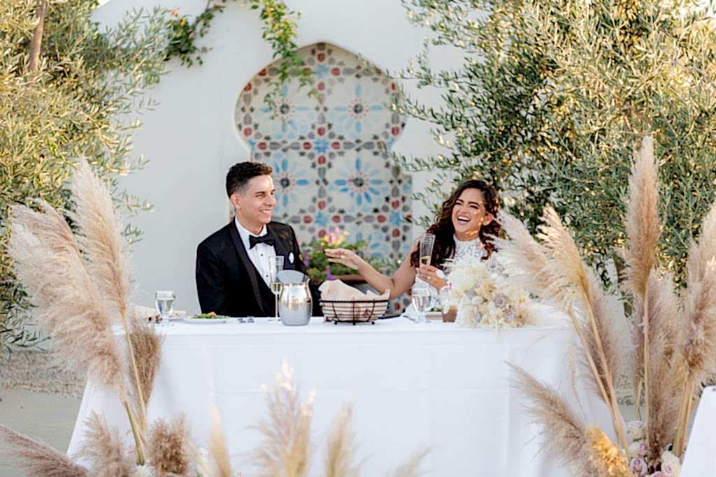 Malibu Estate Wedding couple during dinner
