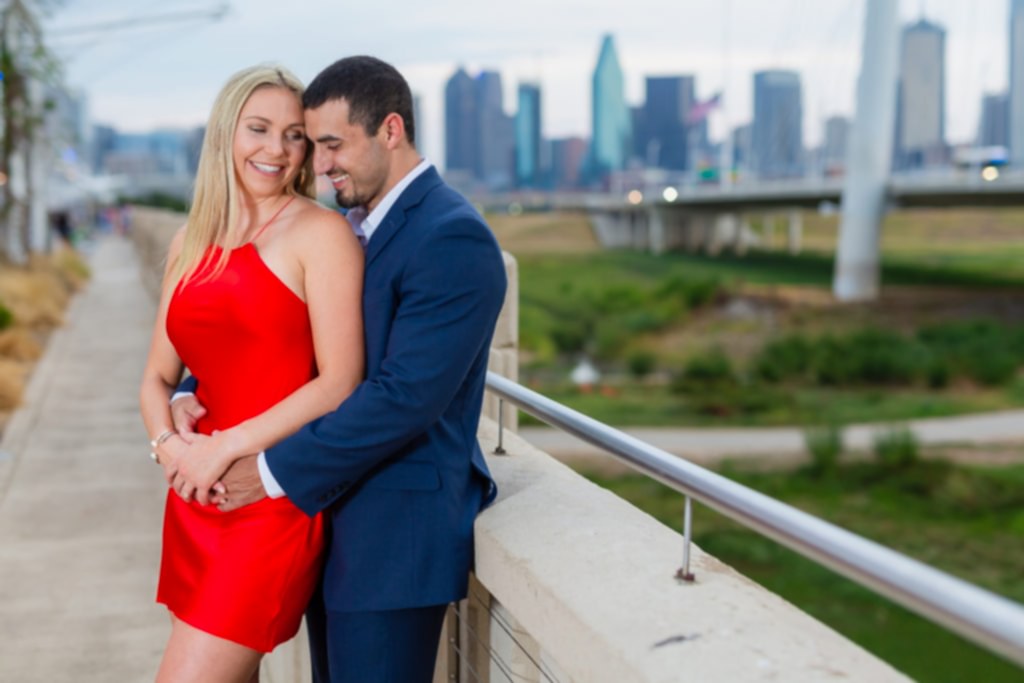 Dallas skyline background during engagement photoshoot