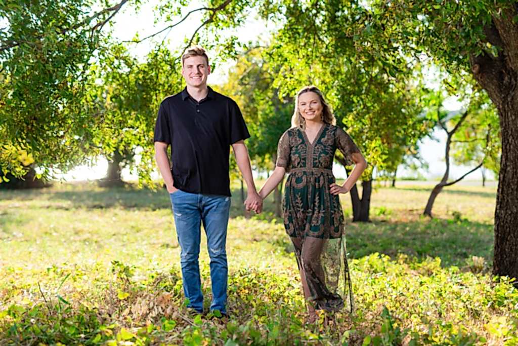 Couple under trees