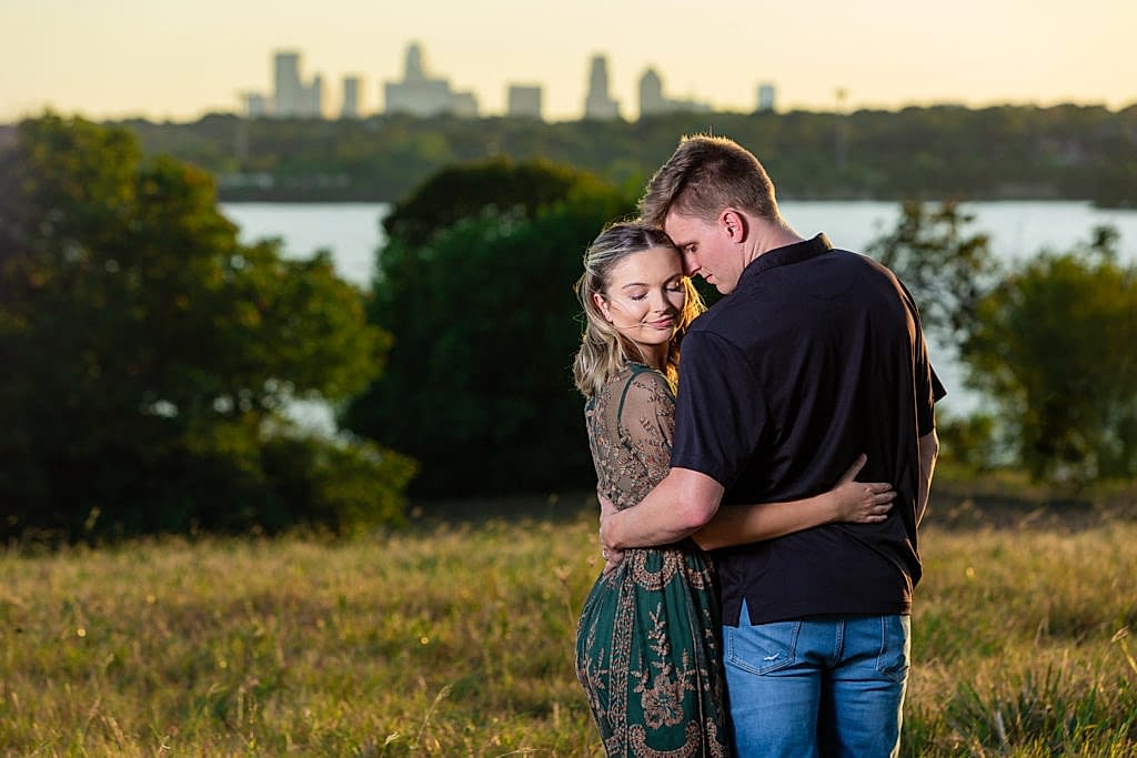 White Rock Lake Engagment photos with skyline