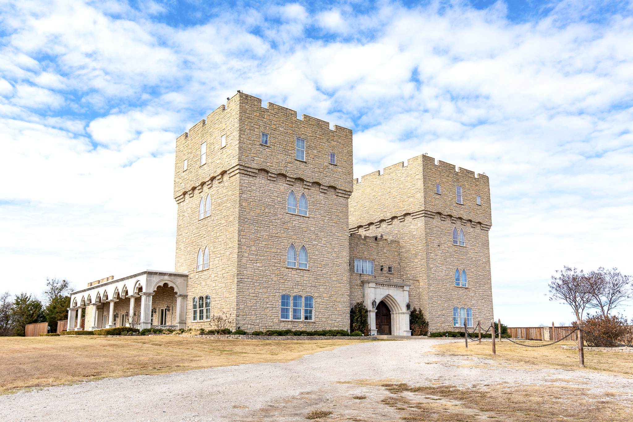 The Castle at Rockwall wedding venue on a cloudy day in Dallas