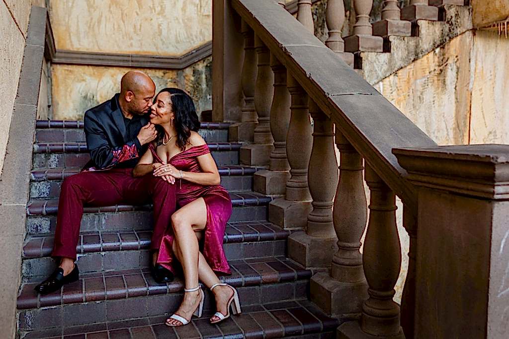 Couple kissing on stairs