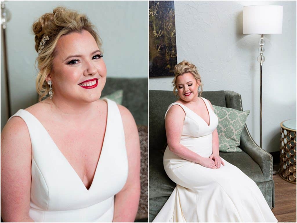 Bridal portraits of the bride smiling and looking down on a velvet green couch in a luxury wedding venue captured by Dallas wedding photographers
