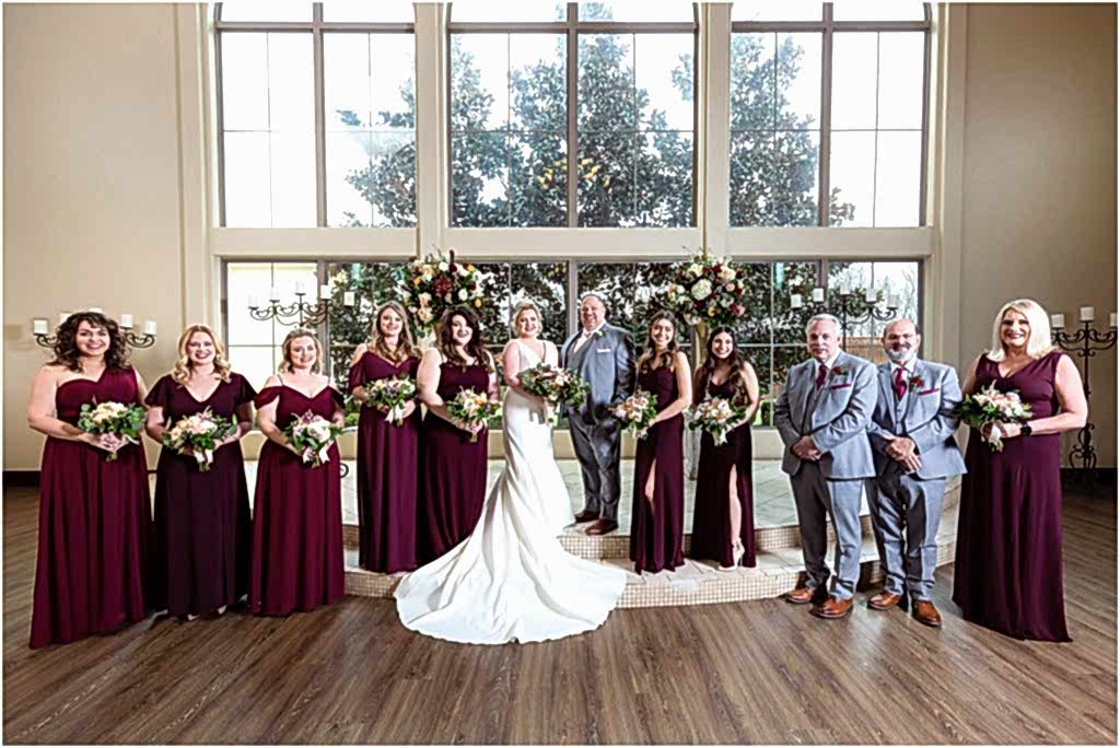 bridal party in red and grey at chapel at ana villa the colony tx captured by Dallas wedding photographers