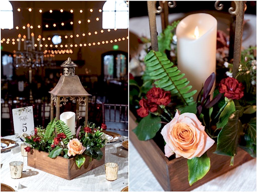 A closeup of Table 5 décor with gold shot glasses surrounding a gold lantern filled with candles and florals photographed by Dallas wedding photographer