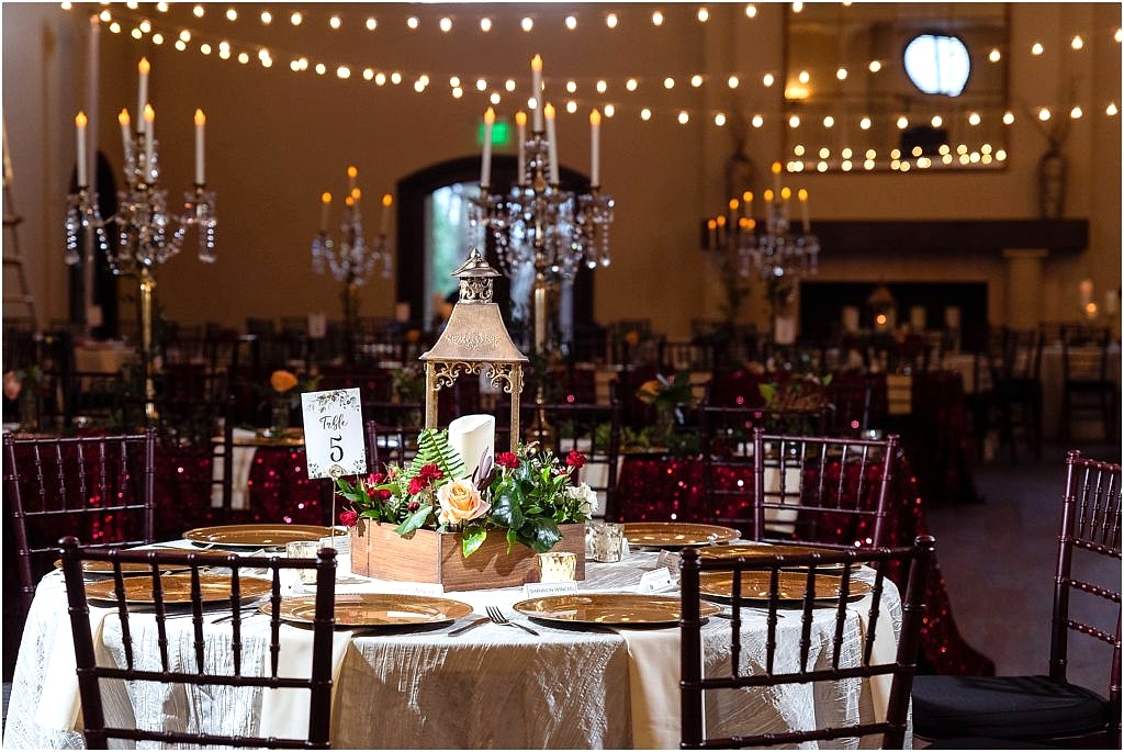 beautiful red themed ballroom with lanterns and twinkle lights at chapel ana villa