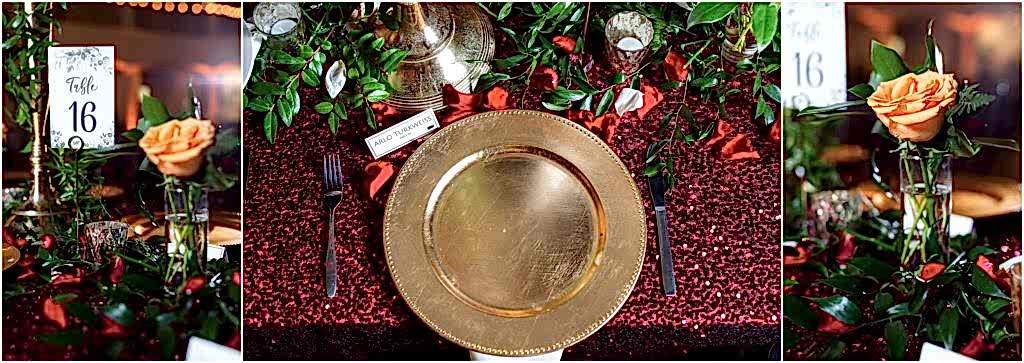 Place settings for luxury dallas wedding venue include gold chargers, orange roses, and glittery maroon table linens photographed by Dallas wedding photographers