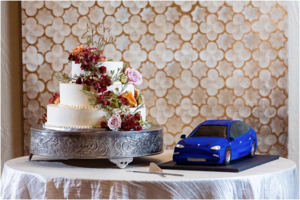 blue tesla grooms cake and white wedding cake with florals at chapel ana villa dallas wedding