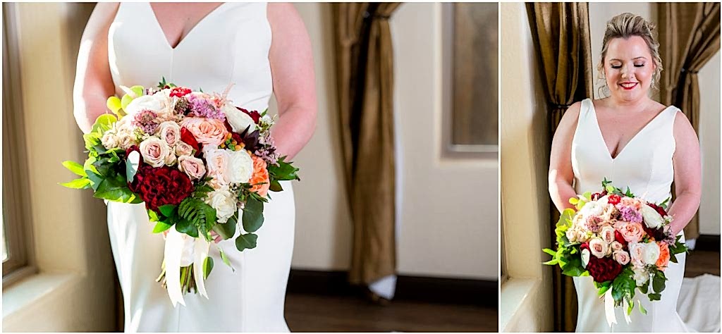 a bouquet of red, white, and pink roses among other flowers held by the bride at The Colony captured by Dallas wedding photographers