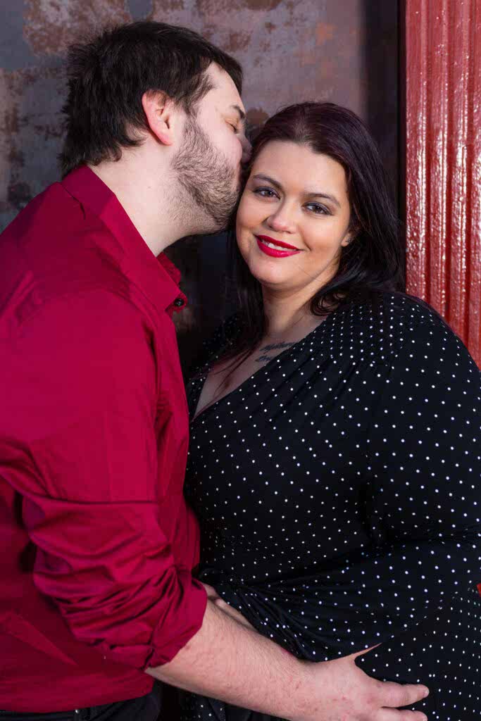 Dallas wedding photographer Stefani Ciotti Photography captures woman looking at camera smiling during Deep Ellum TX engagements