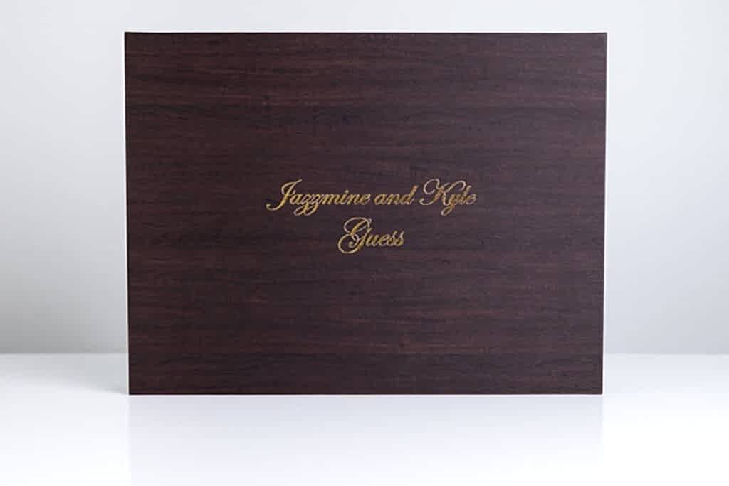 dark wood heirloom box for wedding album safekeeping with bride and groom's name foiled on it