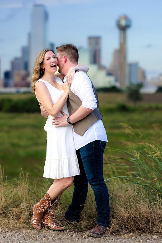 Dallas wedding photographers capture man whispering in woman's ear