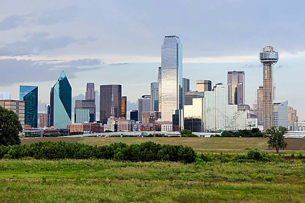 Dallas wedding photographers capture Dallas Skyline while at Trinity Overlook Park