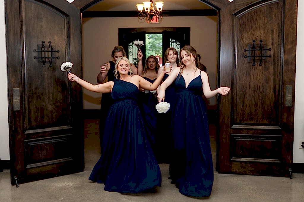 Wedding party dancing during grand entrance