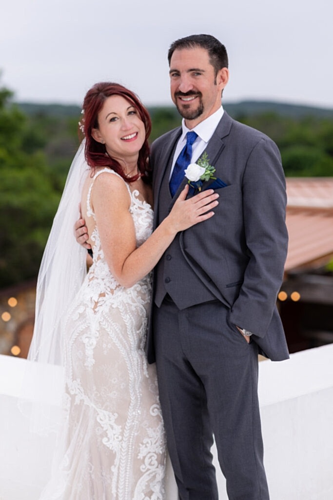 Bride and groom smiling